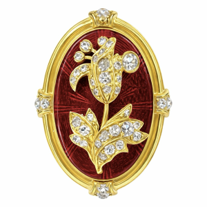 A gold brooch studded with diamonds in an old polish and red enamel work
