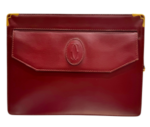 CARTIER Leather clutch bag in a deep burgundy shade from the Must De Cartier Paris series – an elegant iconic item