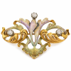 18 carat gold brooch studded with diamonds and artistic enamel